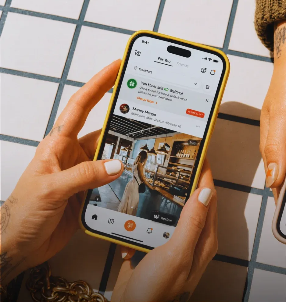 A guest browsing the Wheretogo feed on her phone